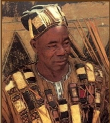 African Priest wearing traditional garb.
